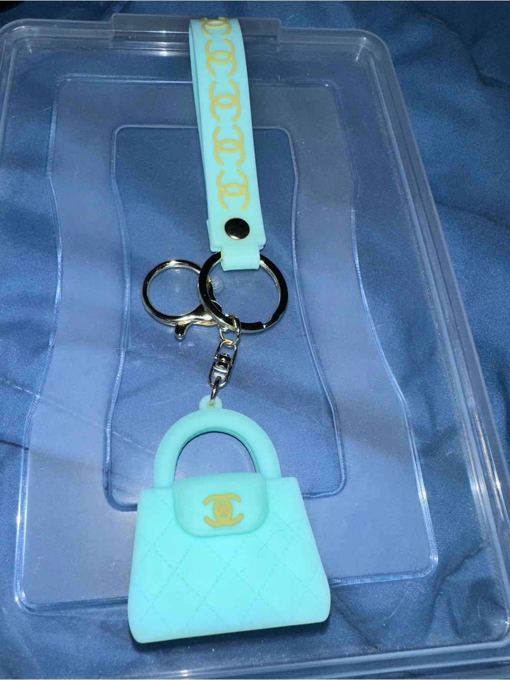 Brand new CC wristlet, and bag charm.